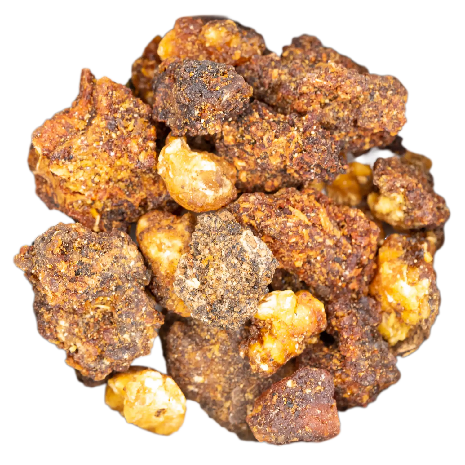 Nahaufnahme von erdend-schützendem Opopanax Räucherwerk (grobe, dunkelbraun-orange Harzstücke). Die Kräuterdrogerie, Wien.