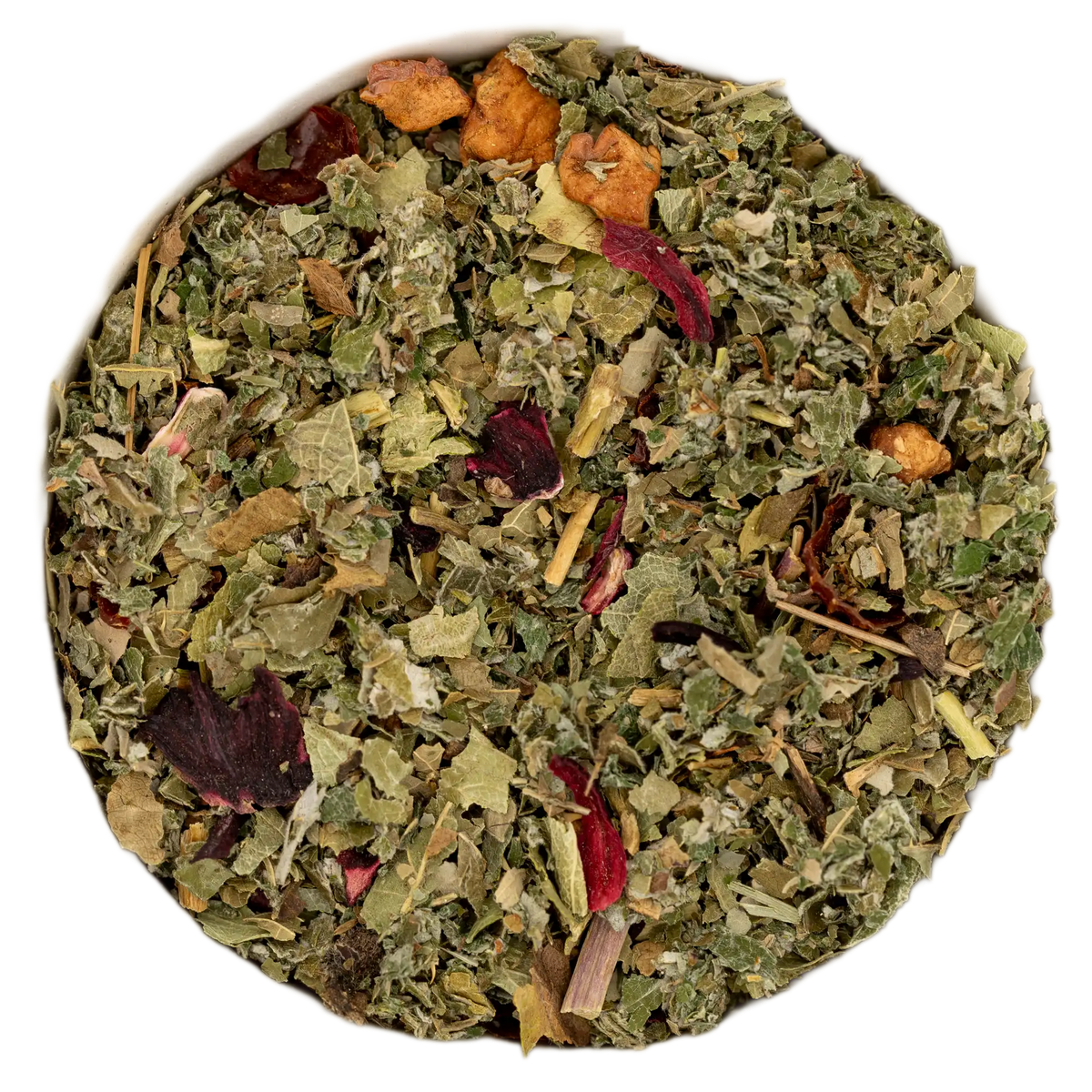 Nahaufnahme der belebend-erfrischenden Morgentee Teemischung (grüne Blätter, Hibiskus, Hagebutte, Apfel). Die Kräuterdrogerie, Wien.